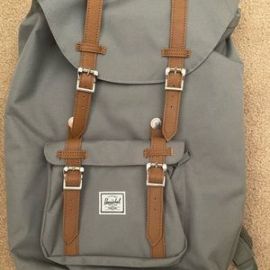 Herschel Little America™ Backpack | Mid-Volume. Gray exterior/ red interior
